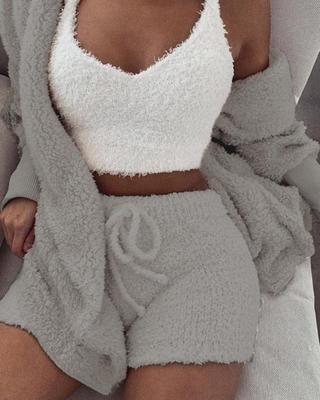 Cozy 3 piece women's sleepwear set featuring a fluffy white crop top and matching gray shorts with a soft cardigan