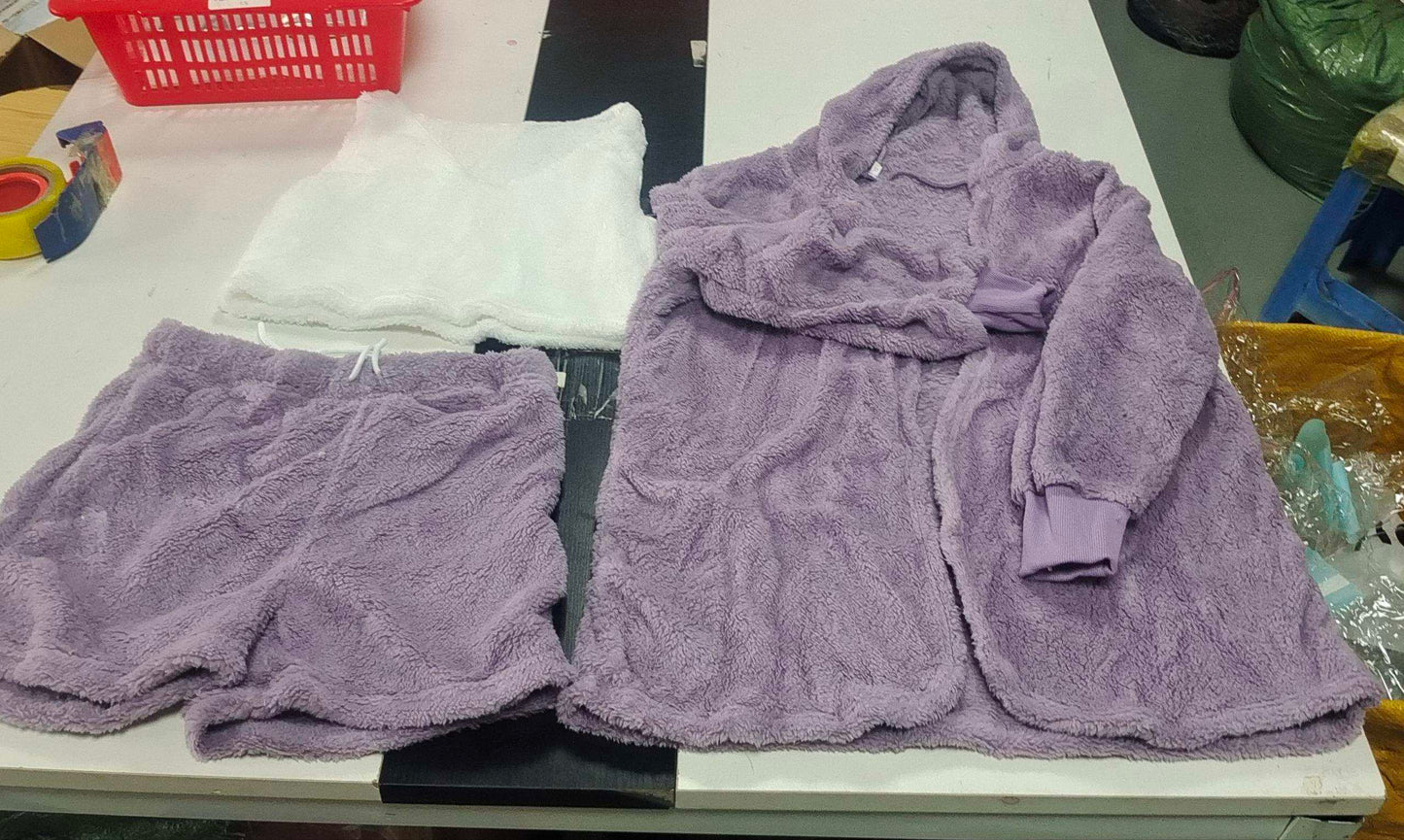 Cozy 3 piece women's sleepwear set with purple fuzzy shorts, matching hooded robe, and white top