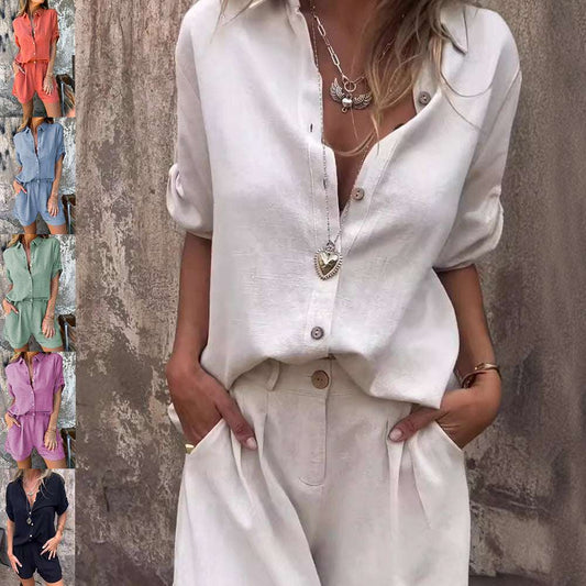 Woman wearing casual pocket shorts and shirt for women in white with rolled sleeves and layered necklaces